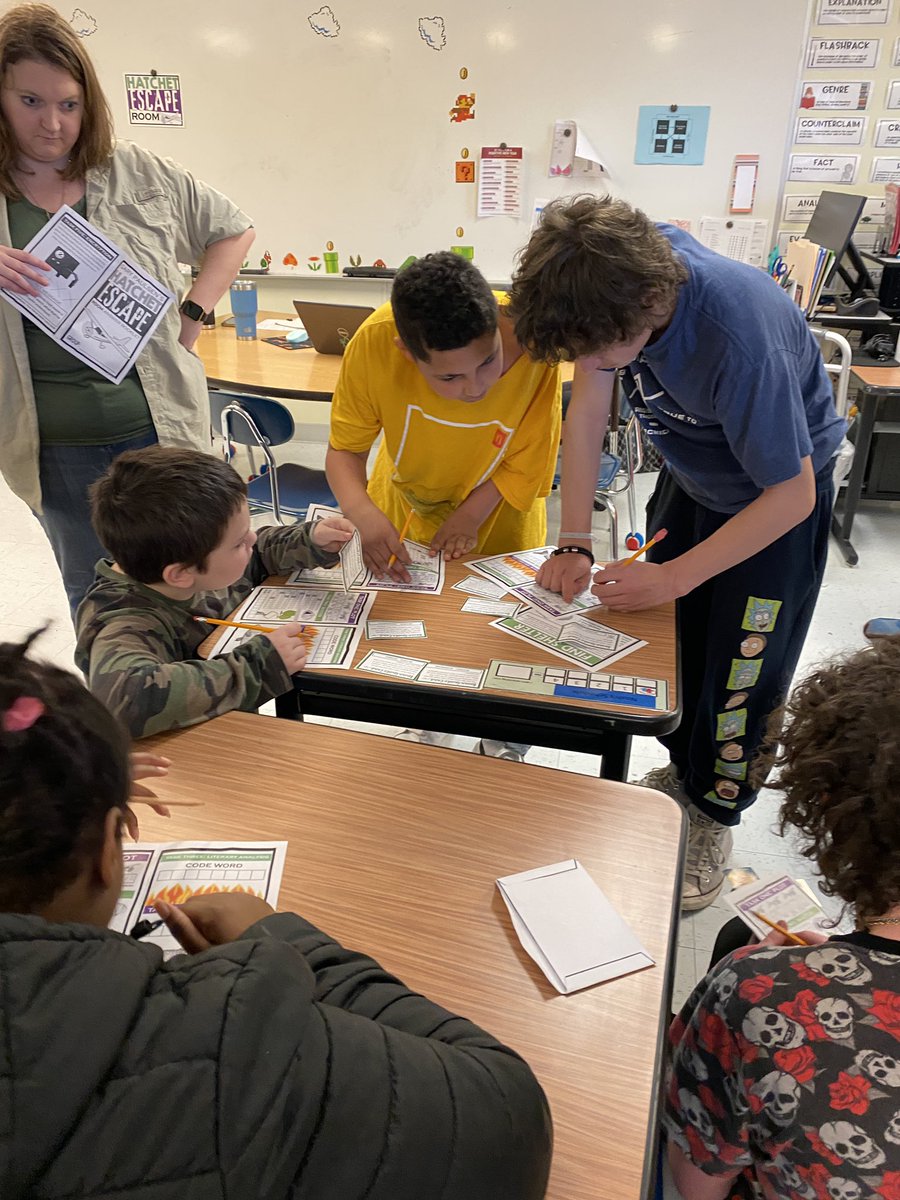 CarteretK12's tweet photo. Friday ESCAPE room at Bridges School. Students read the book Hatchet, and the staff created a differentiated survival escape room with context clues based on the book. Did they escape? You’ll have to ask a Bridges student, their creative staff or @CathyTomon. #BrighterTogether https://t.co/ogzVETdByA