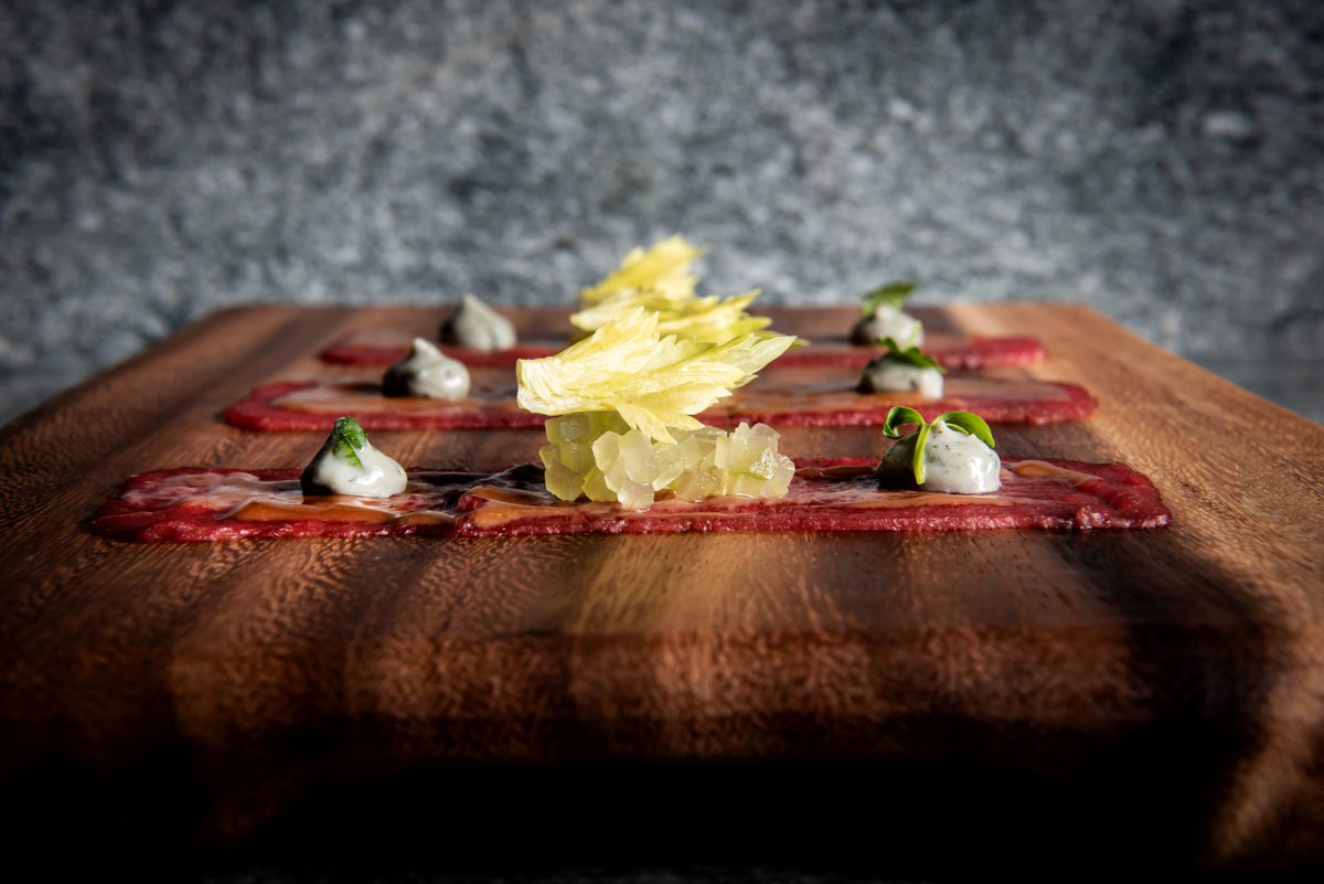 An unexpected twist on a classic #carpaccio at #BazaarMeat #Chicago. Bison – Buffalo style – with pickled celery, bleu cheese and Buffalo wing sauce.