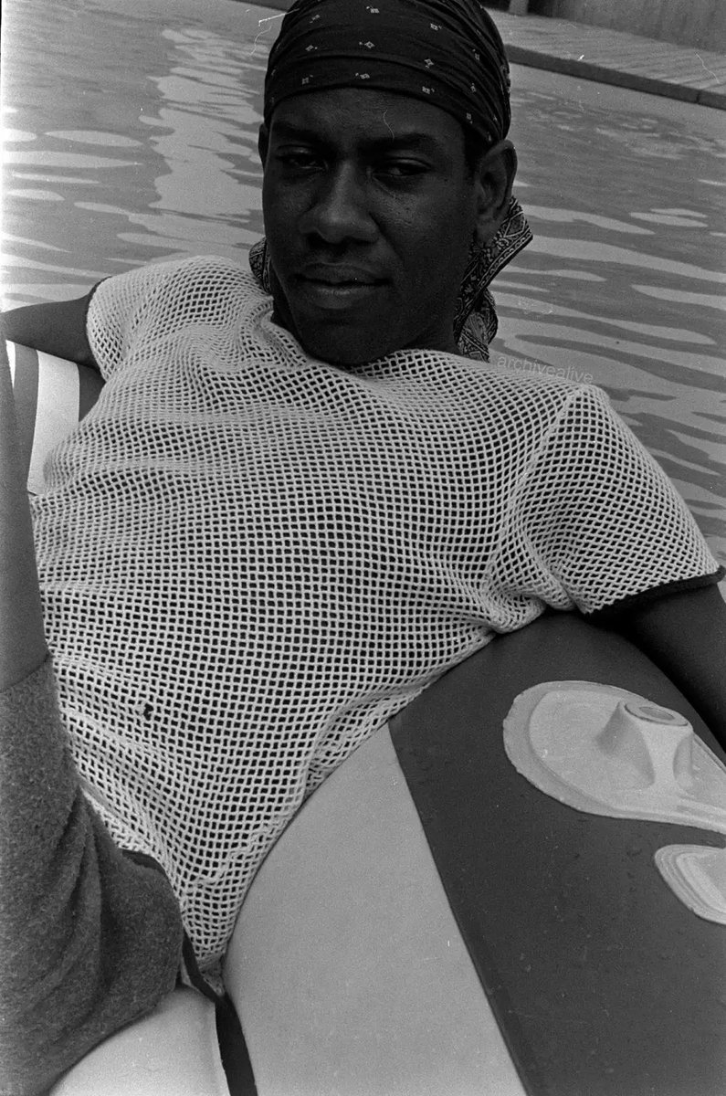 RT @archivealive: Andre Leon Talley wearing a mesh t-shirt and bandana in the pool (Fire Island, Summer 1976) https://t.co/6e9zl6cU0v