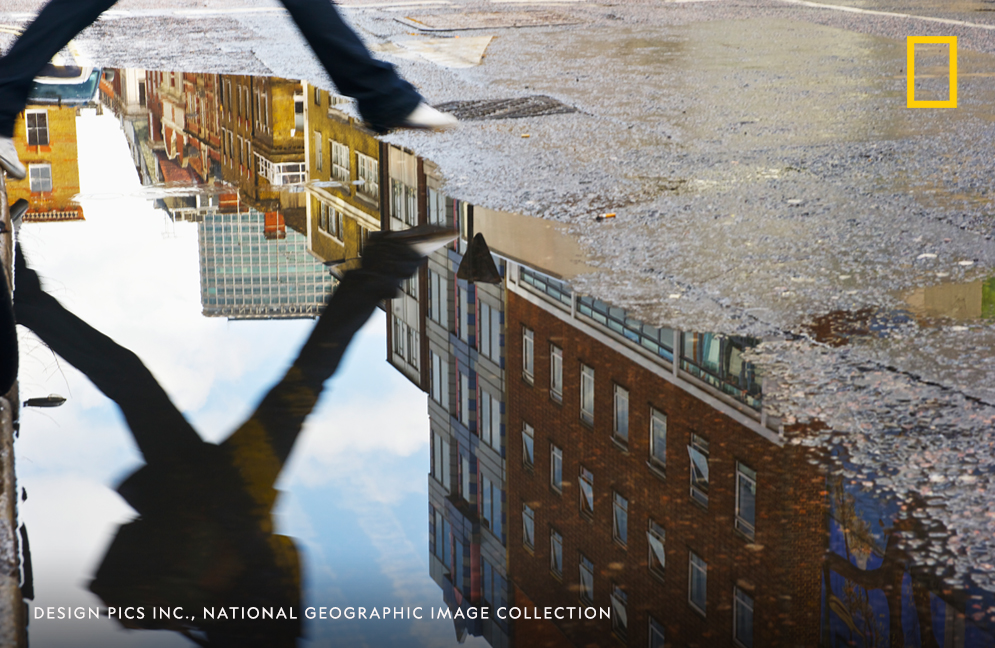 NatGeoTravel's tweet photo. A rain puddle reflects the scenery of Soho in London, England, in this photo from our archives. https://t.co/Ld7vBsCOax