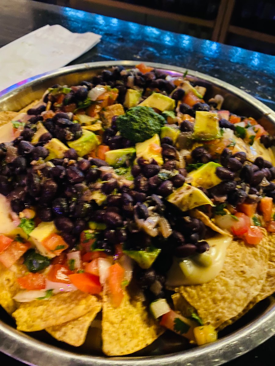 LisaEggerton's tweet photo. Gas station turned craft beer Indian joint in multigenerational success story is #whyaustin oh and these bomb chutney nachos too. @whipin https://t.co/bmthC8nMZu