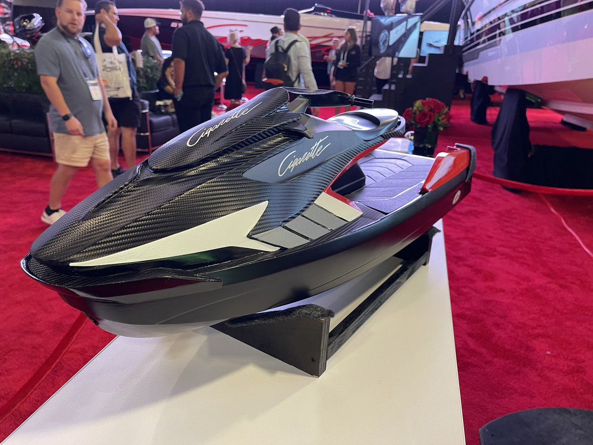JohnHRuiz's tweet photo. NIL Players will be live today at the Miami Boat Show, come by.  Below see our new Cigarette E-Jet small scale model.  You’re going to want one.  Cigarette will finance them with just 5k down.  100% carbon fiber with a Cigarette ride!!! https://t.co/qKJBnlEYfl