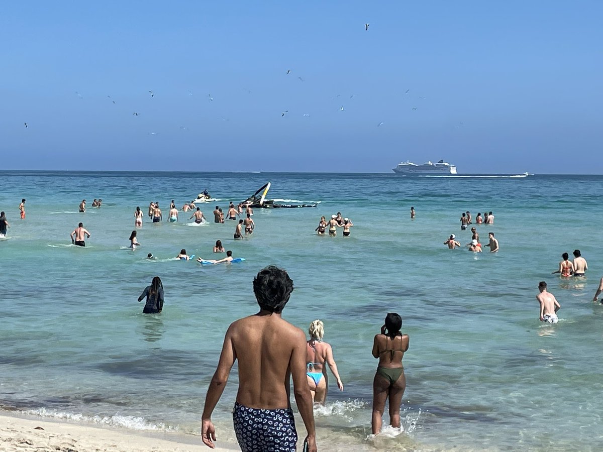 StanthemanAVFC's tweet photo. I’m sittin on south beach Miami… a fuckin helicopter has just crashed into the sea in front of us… https://t.co/U2RCcy63Ot