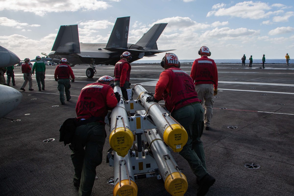PacificMarines's tweet photo. Copy That, on Our Way.
 
@USMC of #VMFA314, @3rdmaw, prepare F-35C Lightning III aircraft for simulated offensive and defensive air operations aboard the Nimitz-class aircraft carrier USS Abraham Lincoln in support of Jungle Warfare Exercise 22 across #Okinawa, #Japan. #USMARINES https://t.co/axUAjEhGuL