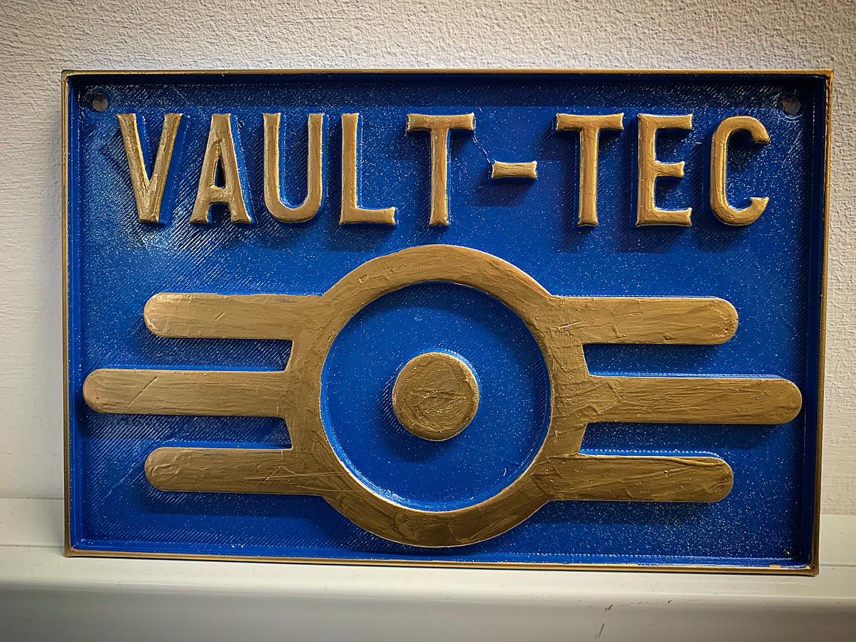 L0v3Train's tweet photo. Had this for a while but only just got round to painting it need to play some fall out soon @BethesdaStudiosc @bethesda @Fallout #fallout #fallout76  #fallout4 #vaulttec #bethesda #plaque #blue #gold #game #games #gammer #stream #streamer #twitch #vault #nuke #3dprint #3dprinting https://t.co/w1AIGFtNEn