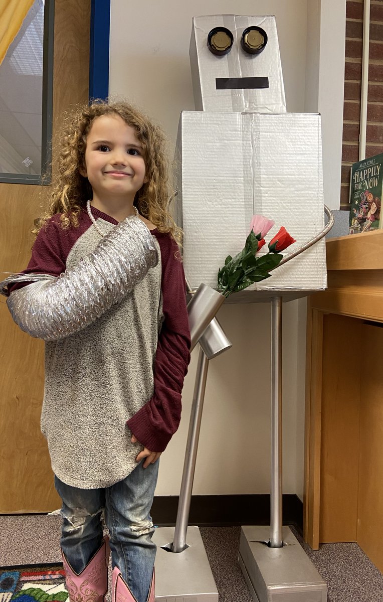 Roz the robot and her number one fan! This first grader arrived at school today dressed as her favorite character in the book we read together as a school. Reading together builds community and inspires the imagination. Books are awesome! <a href="/itspeterbrown/">peter brown!</a> 
#TheWildRobot #WeloveRoz