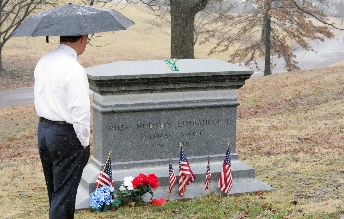 Wayne Weir of Tulsa pays his respects at the grave of the late radio host Rush Limbaugh on the first anniversary of Limbaugh's death at Bellefontaine Cemetery in St. Louis on Thursday, February 17, 2022. Photo by Bill Greenblatt/UPI