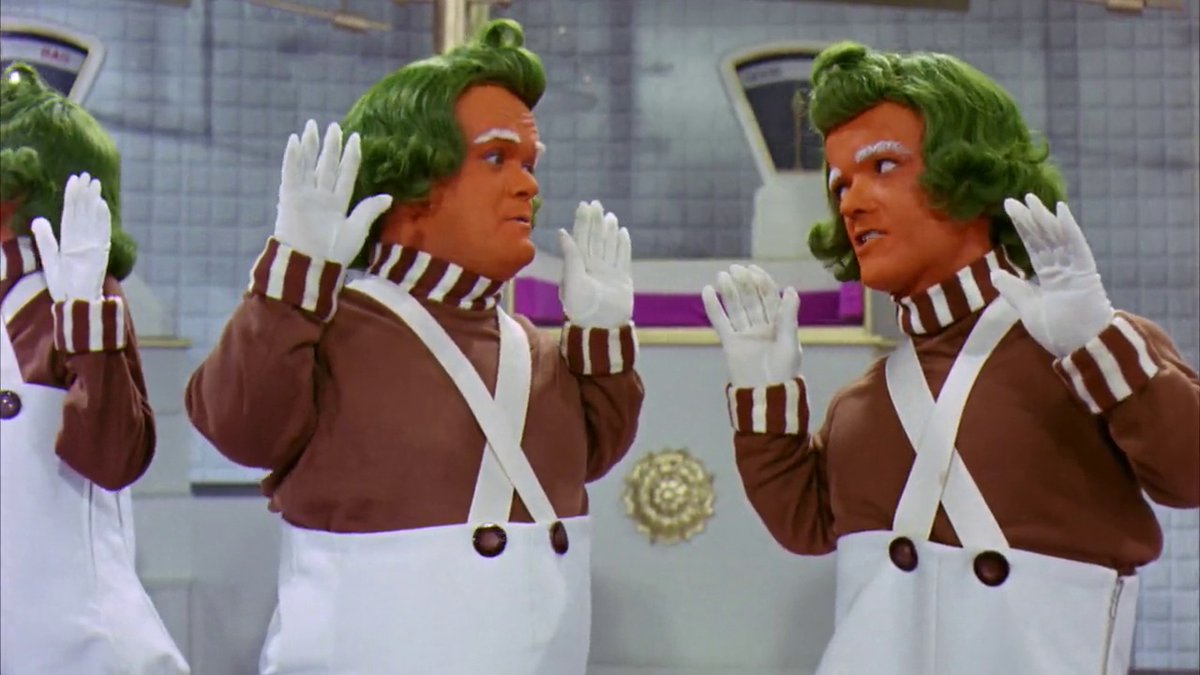 Oompa loompa лесли брикасс. Умпа-Лумпа. Умпа Лумпа шоколадная фабрика. Умпа-лумпы Хью Грант. Умпа Лумпа из Чарли.