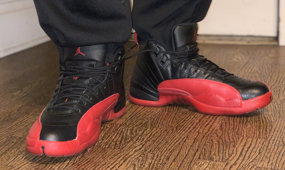 BigDmilz's tweet photo. In celebration of MJ’s birthday, I had to do my #QuarantineDripCheck a lil different. Jordan 12 “Flu Games” on feet. I’m drowning in this warm-up fit and I don’t care. #BHMKOTD @JerLisa_Nicole https://t.co/GwoFb7fpca
