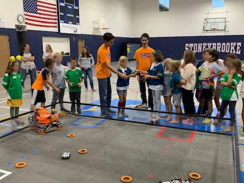 operationtac's tweet photo. We shared our love of robotics to young engineers at our local church youth program featuring K - 6th grade. They had a blast interacting with the robot and eagerly asked even more questions about FIRST Robotics! #FTCOutreach #Robotics #Robots #FTC #Stem #FIRSTTechChallenge https://t.co/NpTAXwSX7q