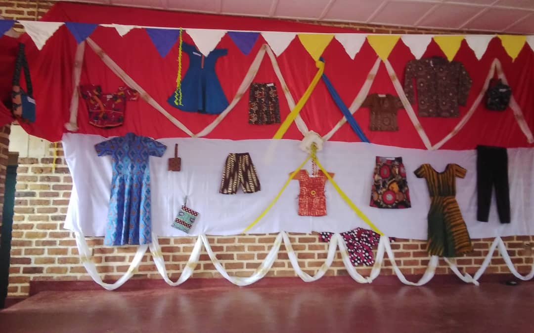 FXBRwanda's tweet photo. Supported to acquire tailoring under USAID Turengere Abana Program, 29 youth are modeling in self-made clothes to celebrate graduation day at TVET school Rafaelo Delle Noche. Local authorities commended partnership with @FXBRwanda to support youth in hands-on skills 
@USAIDRwanda https://t.co/e9KkO8n5TW