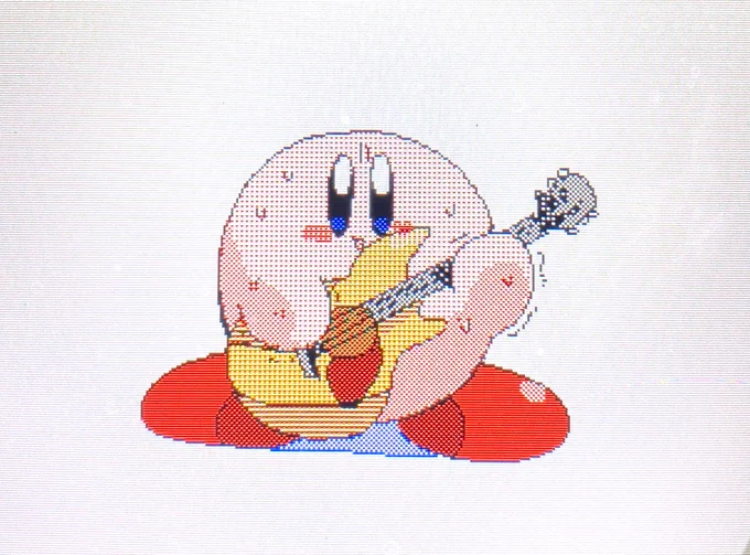 ギターを弾くカービィ 
