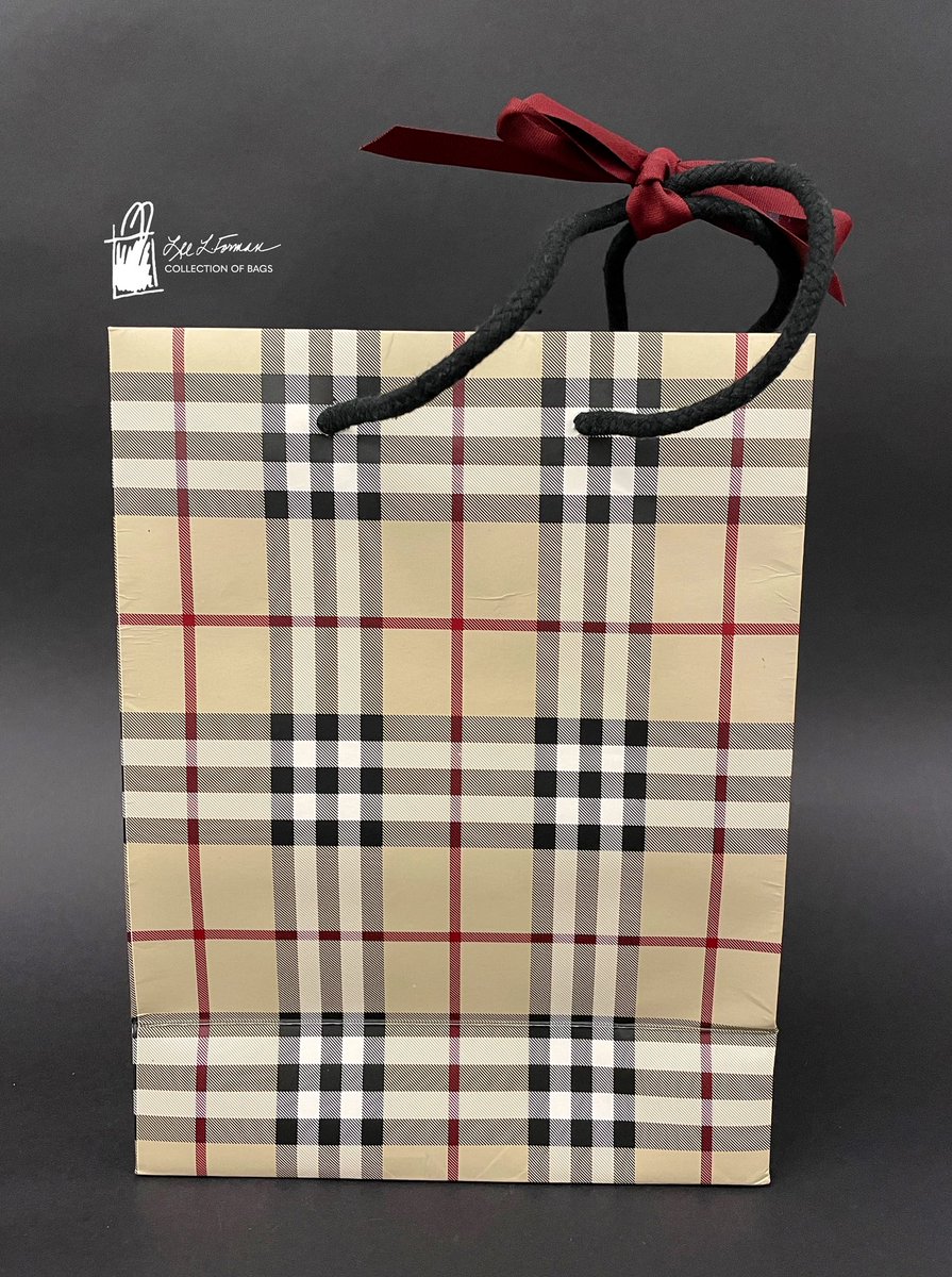 49/365: It’s London Fashion Week, so today’s bag is from London fashion house Burberry. The company was founded in 1856 and became known for its rainwear, even outfitting British troops in WWI. The iconic check was introduced in the 1920s initially as a coat lining.