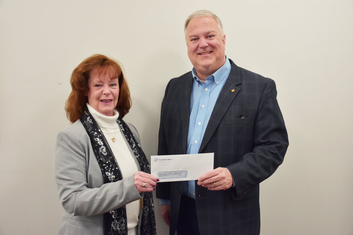 The Chamber Foundation would like to thank 1st Summit Bank for its generous donation. Accepting the check from Don Yeager, Senior Vice President,  1st Summit Bank, is Cindy Cessna of The Chamber Foundation.