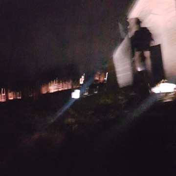 These 2 pictures was taken straight after each other just a second and in the first you can see the church wall is normal but the second picture looks like there is something on it