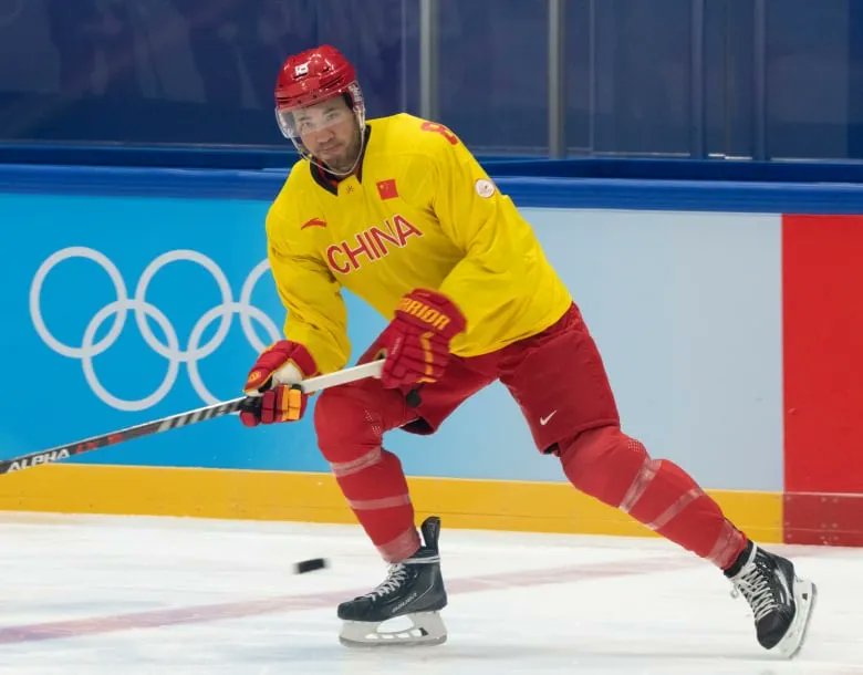 RustlersHockey's tweet photo. Congratulations to #rustleralumni @BYipper18 for captaining Team China in the Beijing 2022 Winter Olympics! What an honour to play on the world's largest stage! Great work Brandon! Read about his story here: https://t.co/jq2TeR7BfW #rustlerrespect #rustlerdesire #rustlerpride https://t.co/p6ecf7anSn