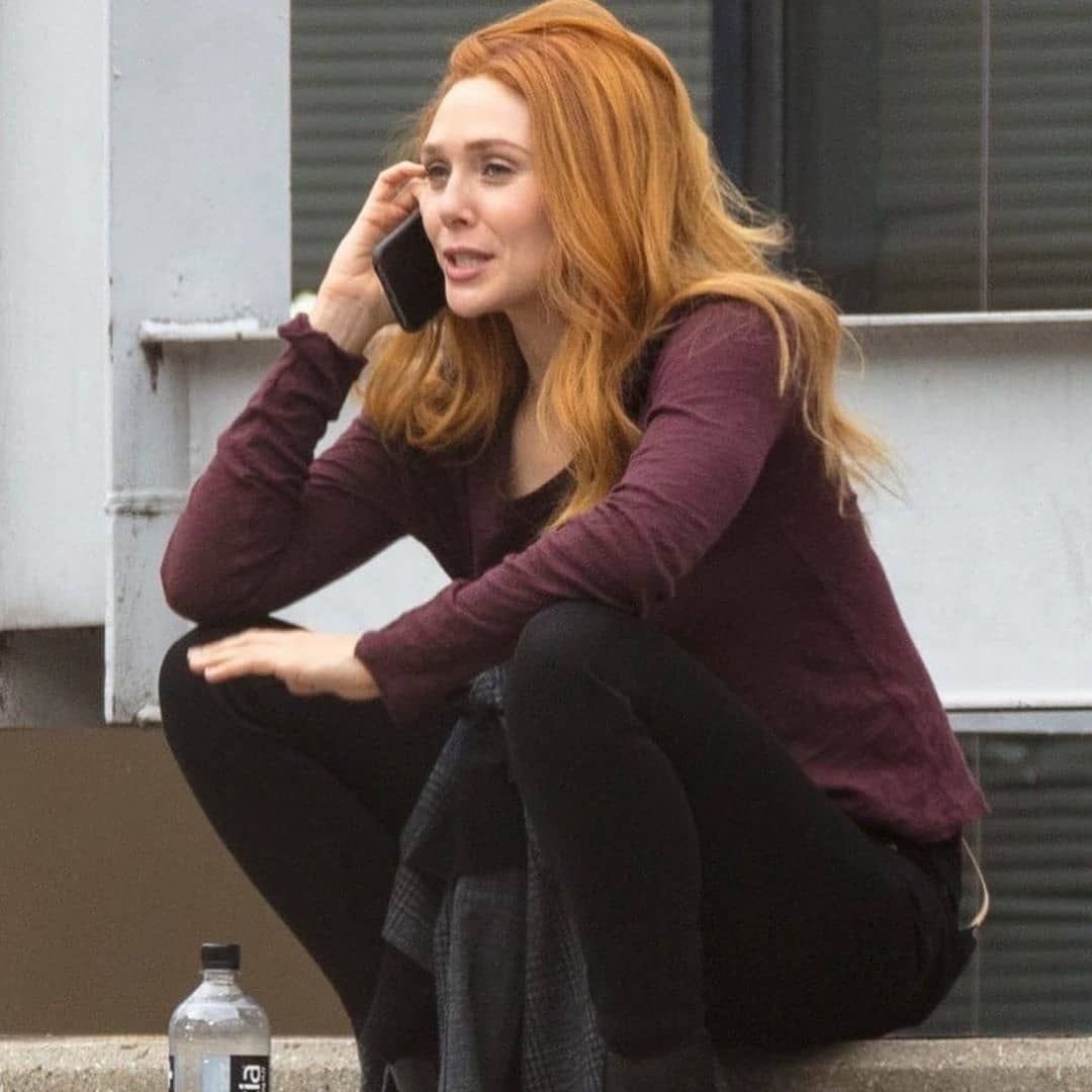 who is she on the phone with?