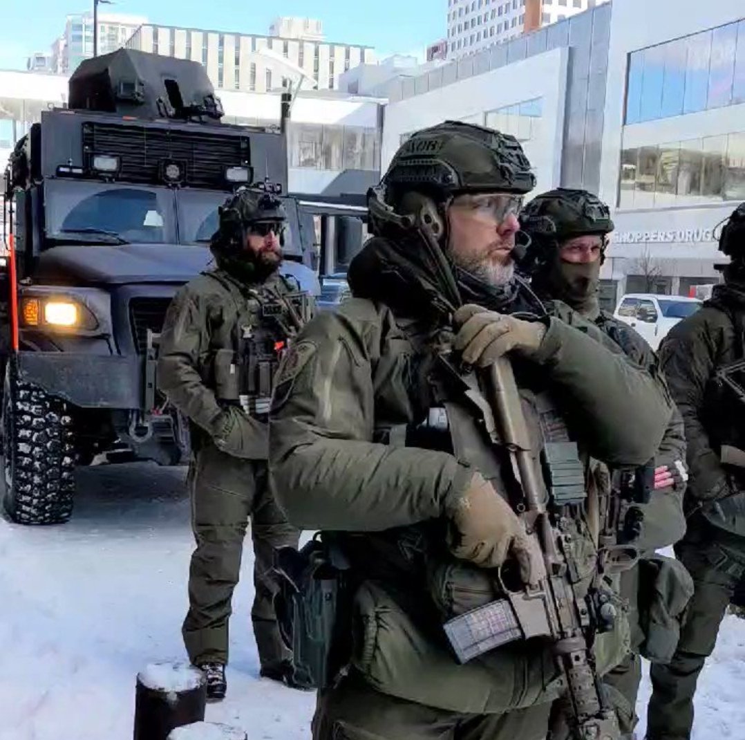 TheRealKeean's tweet image. Trudeau: *slaps a police sticker on combatants.*
"These 'officers' can mow down a protest of 100 in under 3 seconds."