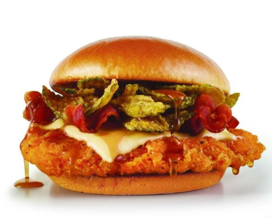 DrewTydeman's tweet photo. @Wendys has the most amazing new chicken sandwich and you have to try it. Wendy's new hot honey chicken sandwich is next level. Crispy Chicken, cheese, three strips of Applewood smoked bacon and crispy pickle chips. Yes Please! #ad https://t.co/XkKTz4dfkr