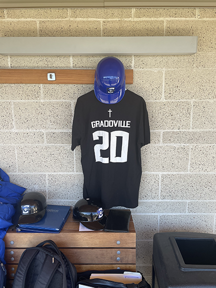 CU_Baseball's tweet photo. His helmet and jersey hang in the visiting dugout today in Portland as the Bluejays begin the 2022 season!

@ChrisGradoville https://t.co/dNs6dNDr8s