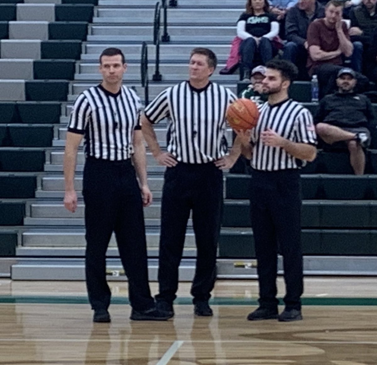 WyoVarsity's tweet photo. All-star crew working tonightโs Thunder Basin-Kelly Walsh game โฆ former โฆ@NCHS_MBBโฉ standouts Mike Robertson and Cole Montgomery with former Wheatland and UW star Casey Bramlet in the middle. #callitbothways ๐ https://t.co/e6YJTaYbnb