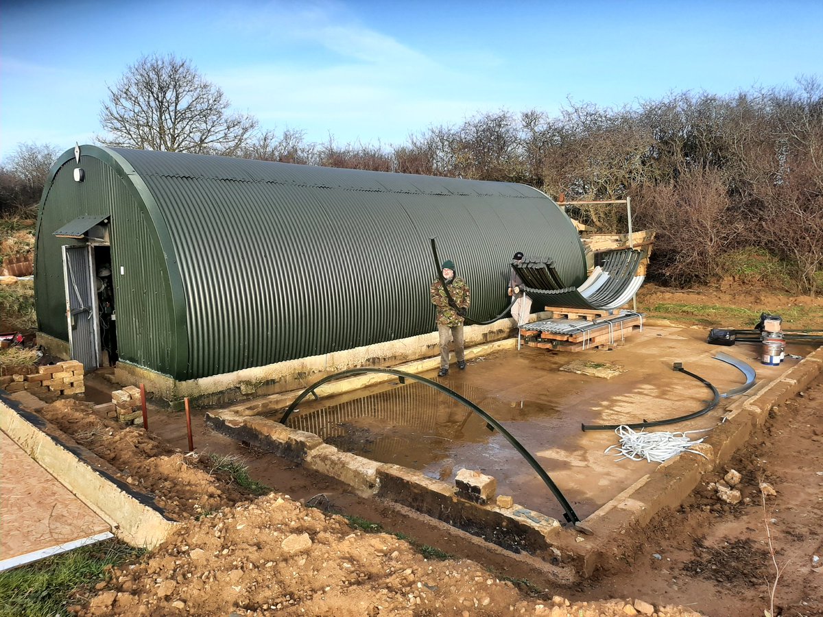 KentPoliceDover's tweet photo. #YouthEngagementOfficer Mark Ball is out today with #DoverVPC at #CapelBattery helping with filling sandbags and construction of a Nissen Hut https://t.co/4lHPWEo2av