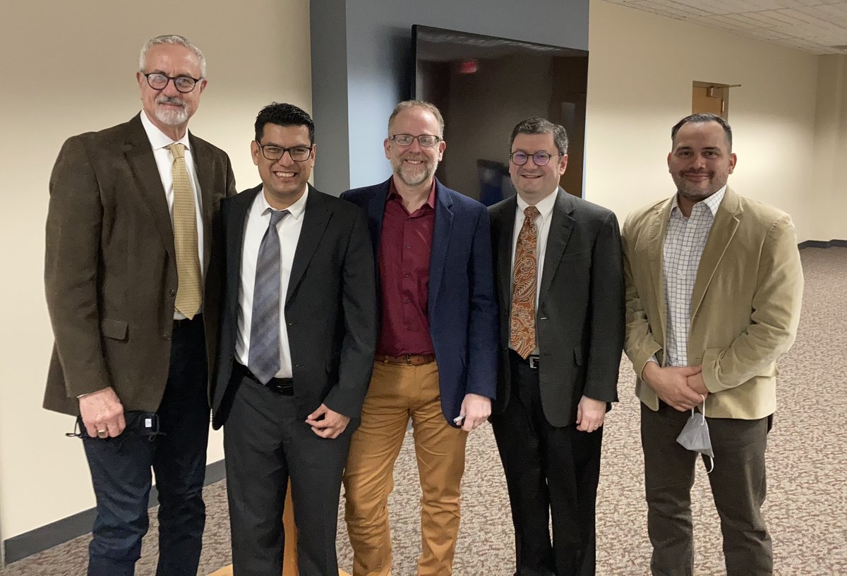 WheatonBTS's tweet photo. Congratulations to the newly-minted Dr. Gerardo Corpeño (second from left) just after his successful dissertation defense! His topic? #Reconciliation and #liberation from a Latin American perspective in dialog with Miroslav Volf and Jon Sobrino. #PhD @WheatonCollege https://t.co/J7qAvkF2bu