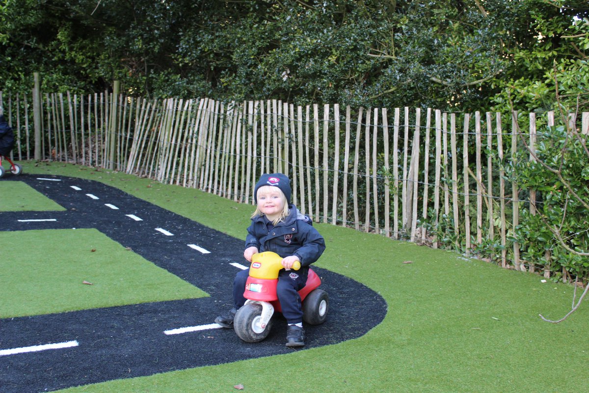 Here is the Pre-Prep bike track in action, complete with parking bays. Even the Headmaster had a go!
