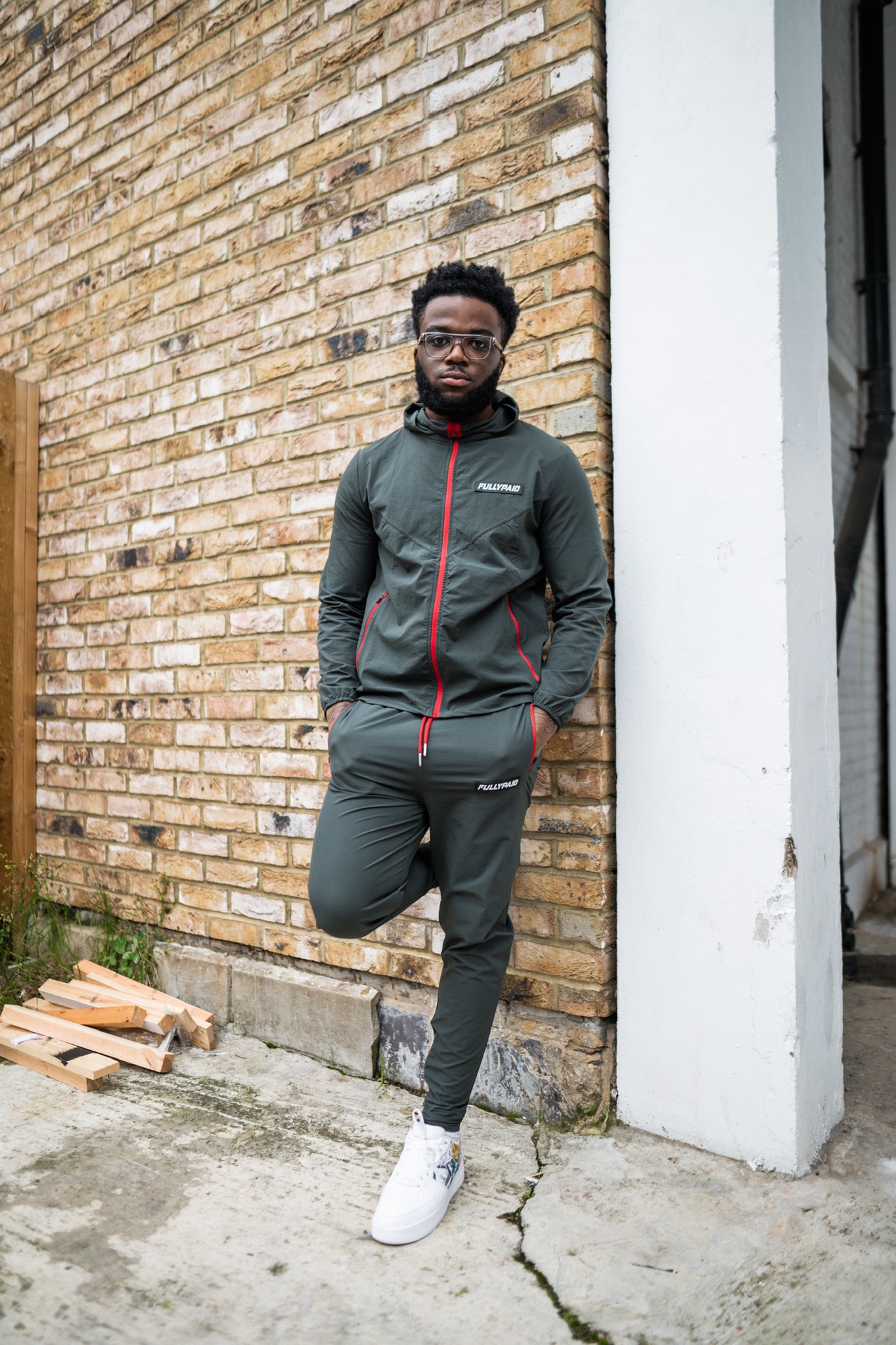 Blanco wearing Fullypaid tracksuit