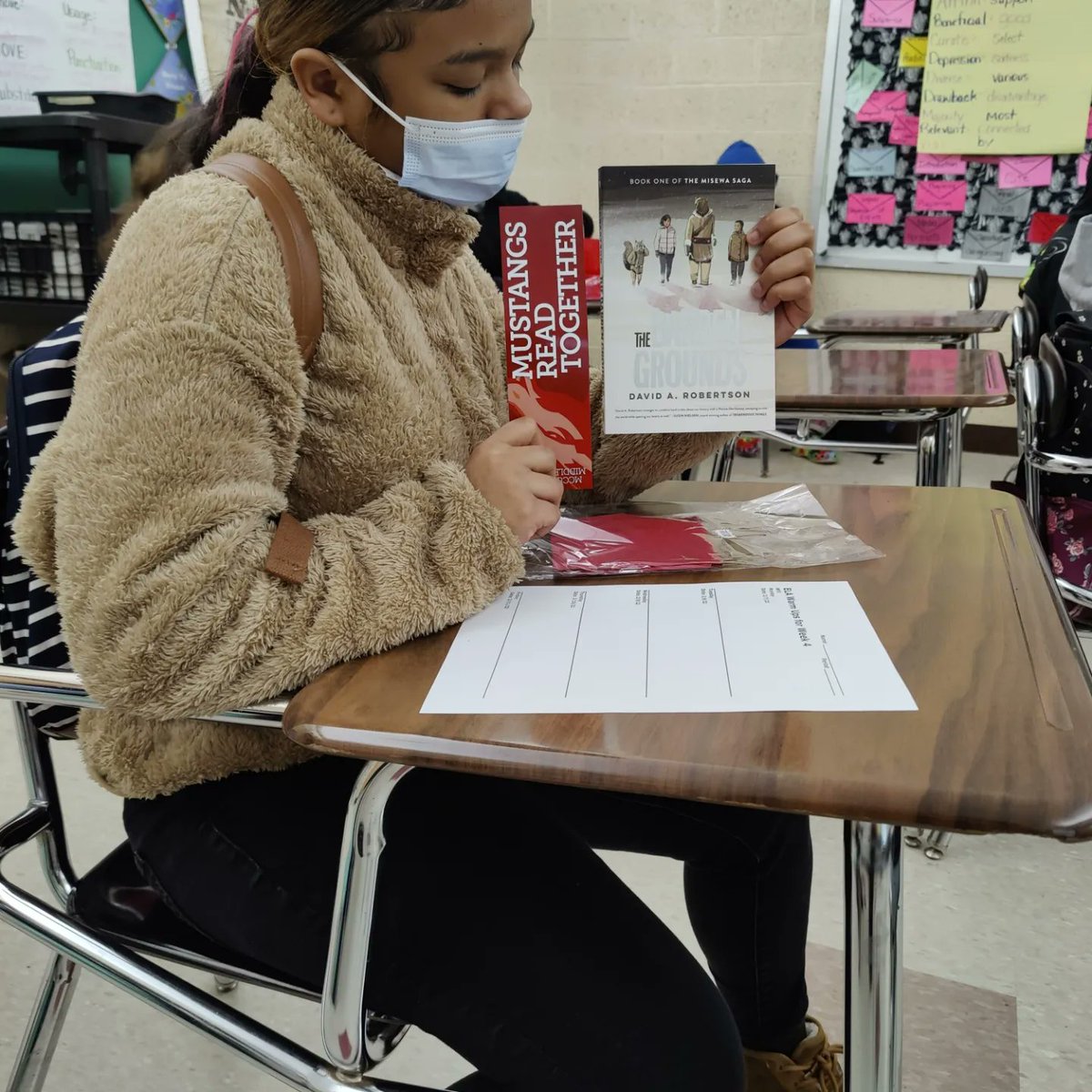 Shaina_Woo's tweet photo. WE're back! The second year of #MustangsReadTogether launched today at McCullough Middle School with The Barren Grounds by David A. Robertson.  
#ILovetoReadMonth #WEread #powerofwecsd #netde https://t.co/N4XHR6knfe