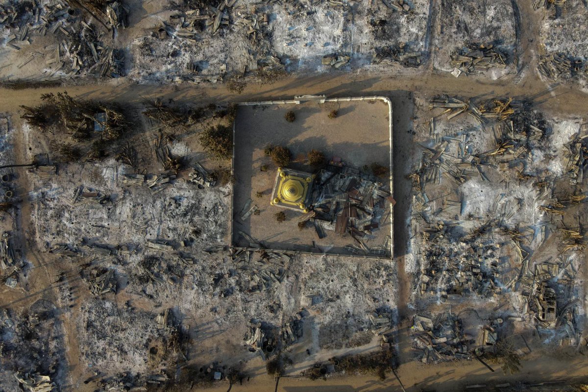 This handout photo taken on February 3, 2022 and released on taken on Feb 5, 2022 shows an aerial photo of burnt buildings from fires in Mingin Township, in Sagaing Division, where more than 105 buildings were destroyed by #myanmar junta military troops, according to local media.