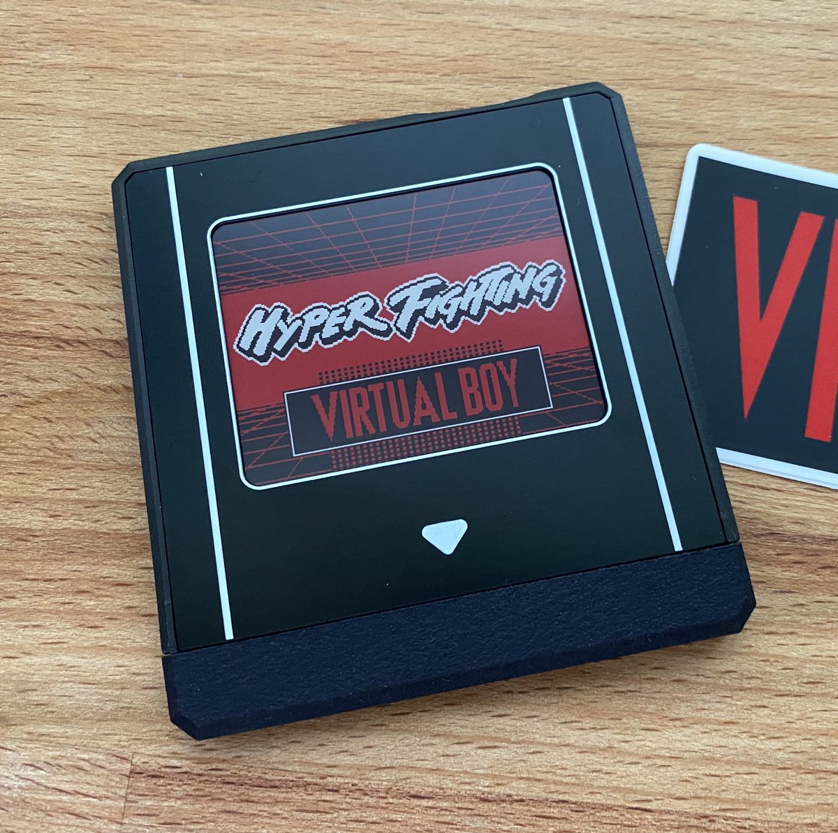 ArielAces's tweet photo. Oh yeah it came in earlier than expected! It’s VR game on! @mellott124 hooked it up!! The #HyperFlash32 is extremely well made. The e-ink screen is 🔥! #VirtualBoy https://t.co/hoxXpREUs8
