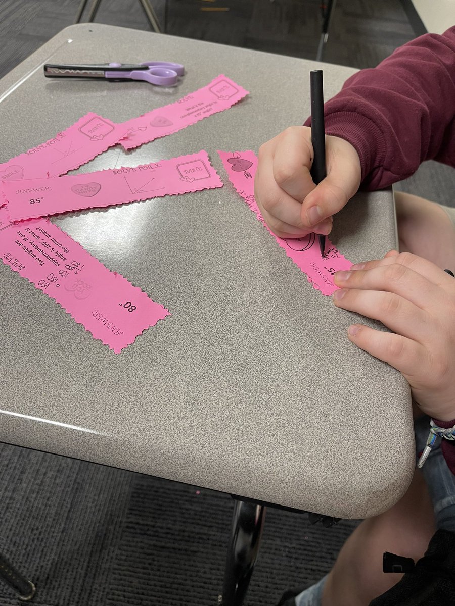 IvyHawnMath's tweet photo. Valentines paper chains made out of our angles and Pythagorean Theorem practice problems! @IvyHawnSuhr #funwithmath https://t.co/Rn9iu7TovK