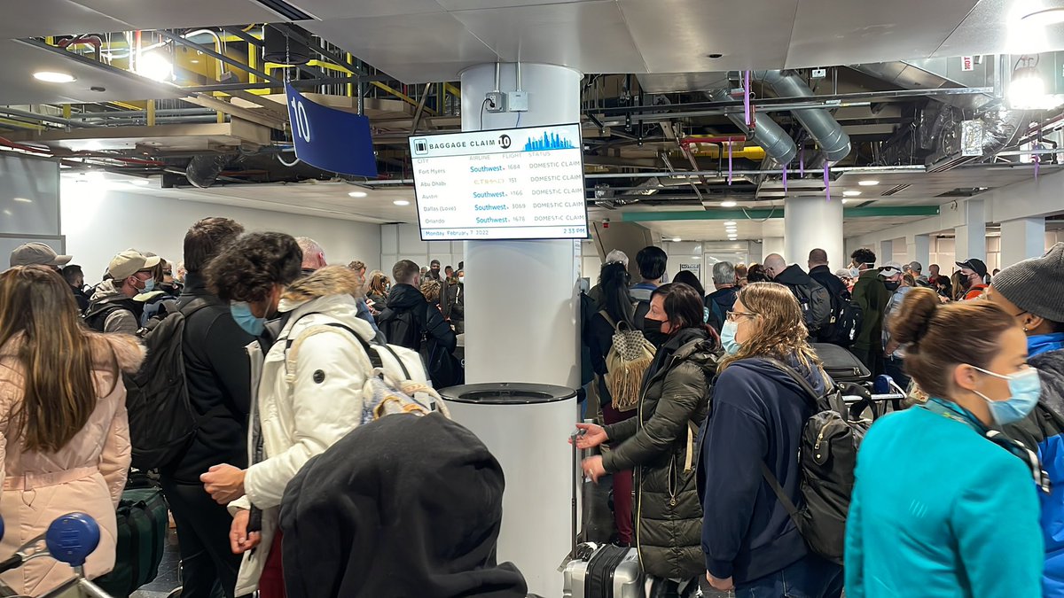 dansellschicago's tweet photo. Got COVID??  

Terminal 5 baggage claim  😳
#ridiculous #joke #southwestairlines https://t.co/GkzNZNvE4y
