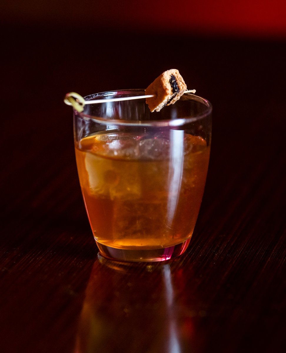 Go Fig or Go Home — A 2021 DCR original cocktail made with Rye Whiskey, Oloroso Sherry, Fig Liqueur, Vanilla Cherry Bark Bitters, and Clove Smoke.