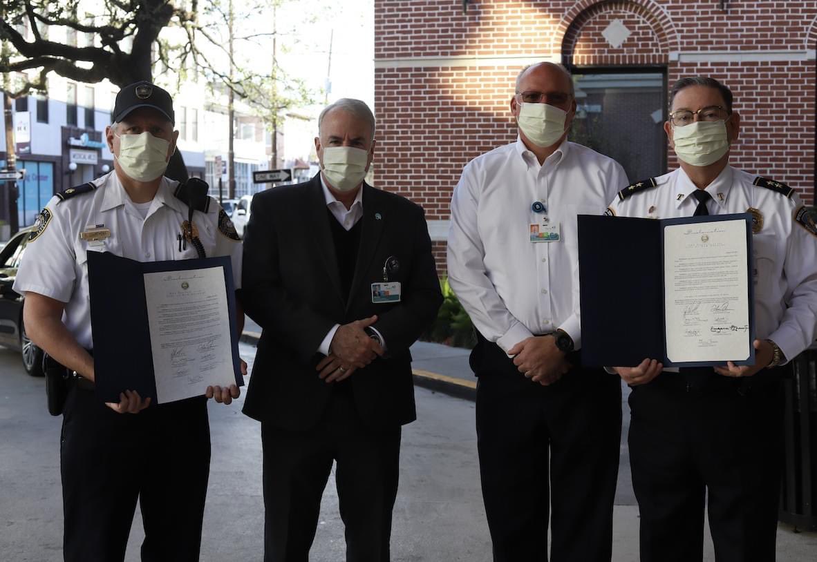 TouroInfirmary's tweet photo. New Orleans City Council Members Lesli Harris and JP Morrell, recognized Touro Security Officers Frank Graff and Eddie Colmenero with commendations for their heroic actions protecting our patients and community from an incident involving gunfire that occurred near the hospital. https://t.co/4xpg66WFvy