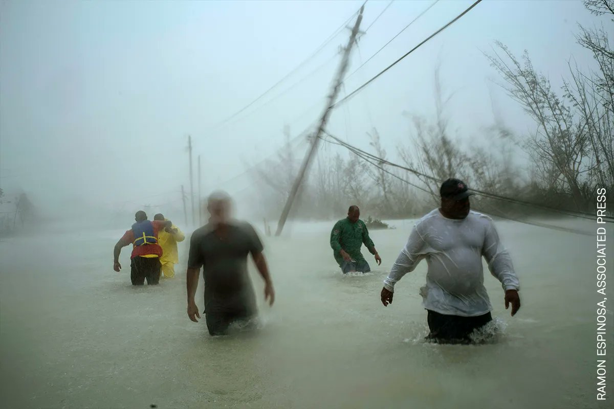 World Press Photo (@worldpressphoto) on Twitter photo Photo of the Day | Volunteers wade along a flooded road in Freeport, Grand Bahama, after Hurricane Dorian hit the island in September 2019. By Associated Press (<a href="/AP/">The Associated Press</a>) photographer Ramon Espinosa (<a href="/AP_respinosa/">Ramon Espinosa</a>): bit.ly/3ou3gpm Photo of the Day | Volunteers wade along a flooded road in Freeport, Grand Bahama, after Hurricane Dorian hit the island in September 2019. By Associated Press (<a href="/AP/">The Associated Press</a>) photographer Ramon Espinosa (<a href="/AP_respinosa/">Ramon Espinosa</a>): bit.ly/3ou3gpm