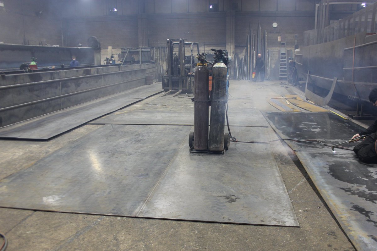 EthelBarge's tweet photo. They’re off! We’re so excited to say that the boatbuilders, Colecraft, have started to build our new barge, Pearl! These giant steel plates will form the bottom of the barge. #PearlsProgress #Colecraft https://t.co/0hZ97gI800