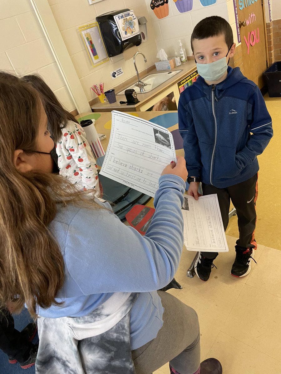 MrsCNettesheim's tweet photo. We are practicing Fact and Opinion writing so we shared some facts and opinions about sharks with partners today! 🦈 #fa58share #dg58learns #dg58pride #LearningLastsForever https://t.co/oeNjY2xC62