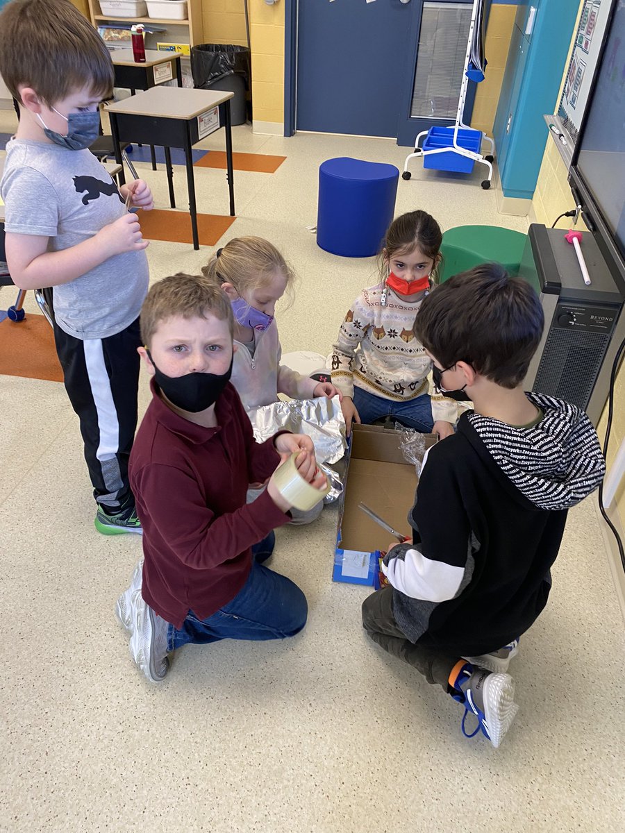 FaheyReid's tweet photo. Scientists working to construct a contraption to keep a Mr. Freezie frozen for a period of time. I wonder what materials would work best? https://t.co/ESp9P3liEz