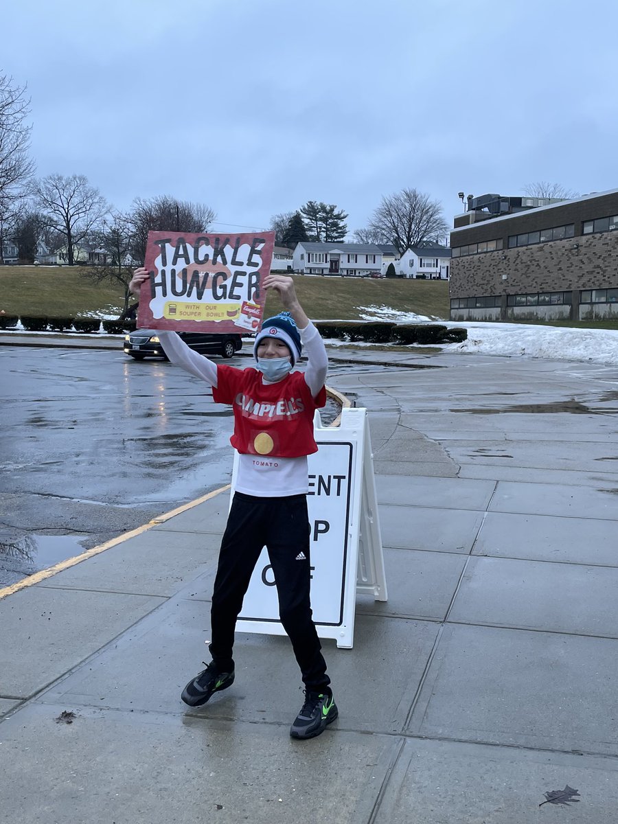 One of our Rockstar students getting the word out during student arrival for our soup drive this week!  Please support him and all our students by dropping off soup at Martin this week. @sandy_forand <a href="/BillBlackRI/">Bill Black</a>
