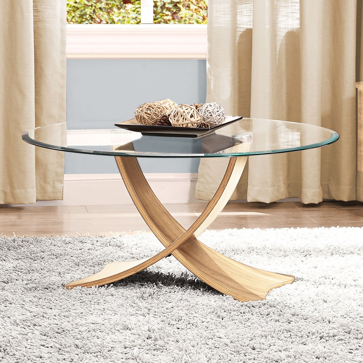 wood_furniture's tweet image. The striking Siena coffee table is perfect for giving smaller rooms a sense of space - with sweeping legs made of oak veneer and bevelling detail on the round glass top, this coffee table makes a stunning centrepiece #woodenfurniture #glasscoffeetable wooden-furniture-store.co.uk/siena-oak-and-…