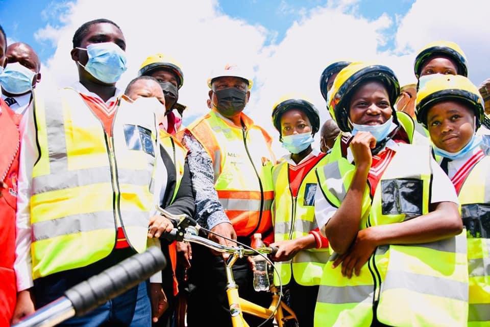 President Ramaphosa, Premier Mathabatha and MEC for Transport and Community Safety Mavhungu Lerule-Ramakhanya during the handover of bicycles to learners for shovakalula Project Initiative.