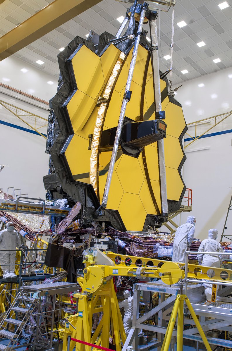 The James Webb Space Telescope's hexagonal, gold-plated primary mirror — made up of 18 segments — is fully deployed during testing in Northrop Grumman's facilities.