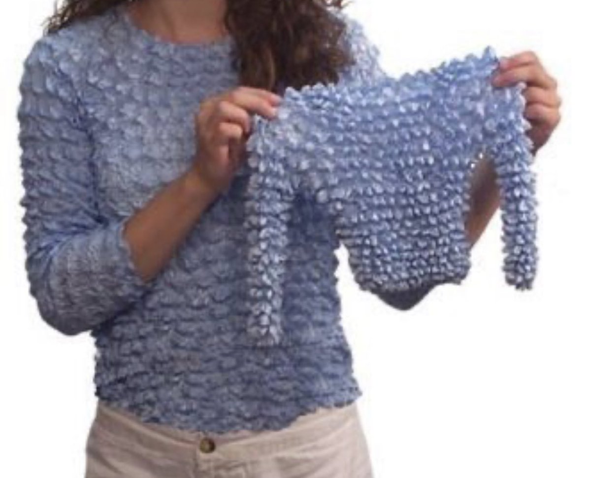 For reasons I cannot explain, the thought I had as I transitioned from  sleeping to waking this morning was what if a wedding dress, but made out  of 90s popcorn shirt material