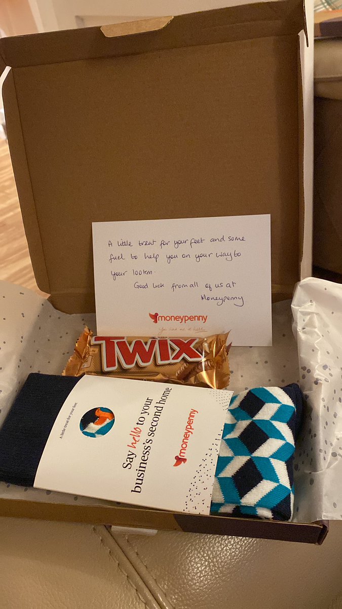 Neilwhitton's tweet photo. Many thanks for the socks and chocolate @Moneypenny for completing #athoughtfordementia 100k challenge. https://t.co/H0hhfnIehn