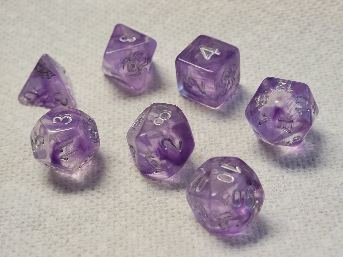AAdventures2's tweet photo. I've been doing some personal crafting recently before we come off hiatus, and this afternoon I tried re-inking this transparent set! I love the coolness that the silver brought to this set of dice, perfect for my Drow Druid.
Have you ever re-inked a set of dice? https://t.co/h5pdLsdMHh