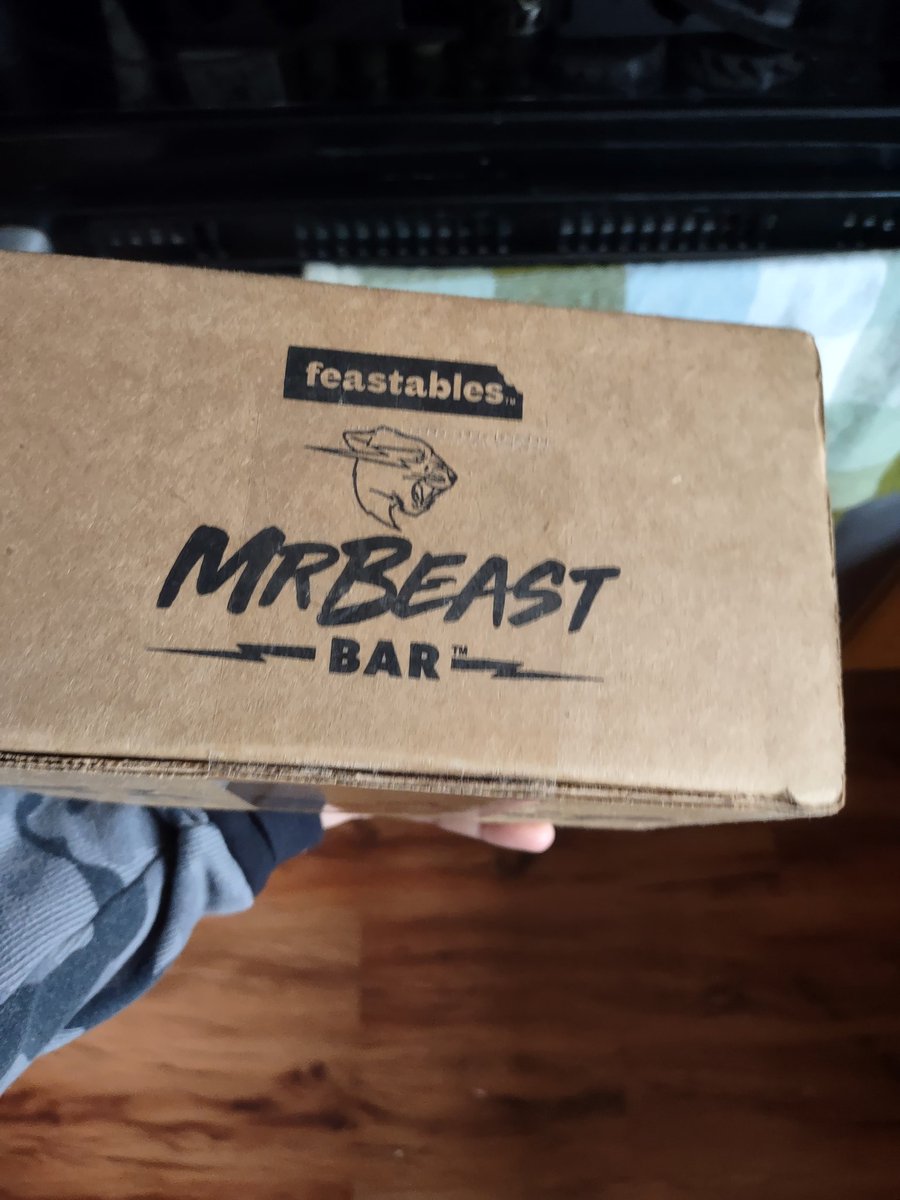 NinfoStudios's tweet photo. Looks great in our cabinet! Thanks @MrBeast #mrbeast #feastables #mrbeastbars #beastbars #chocolate #yum https://t.co/4r1zfDpqbd