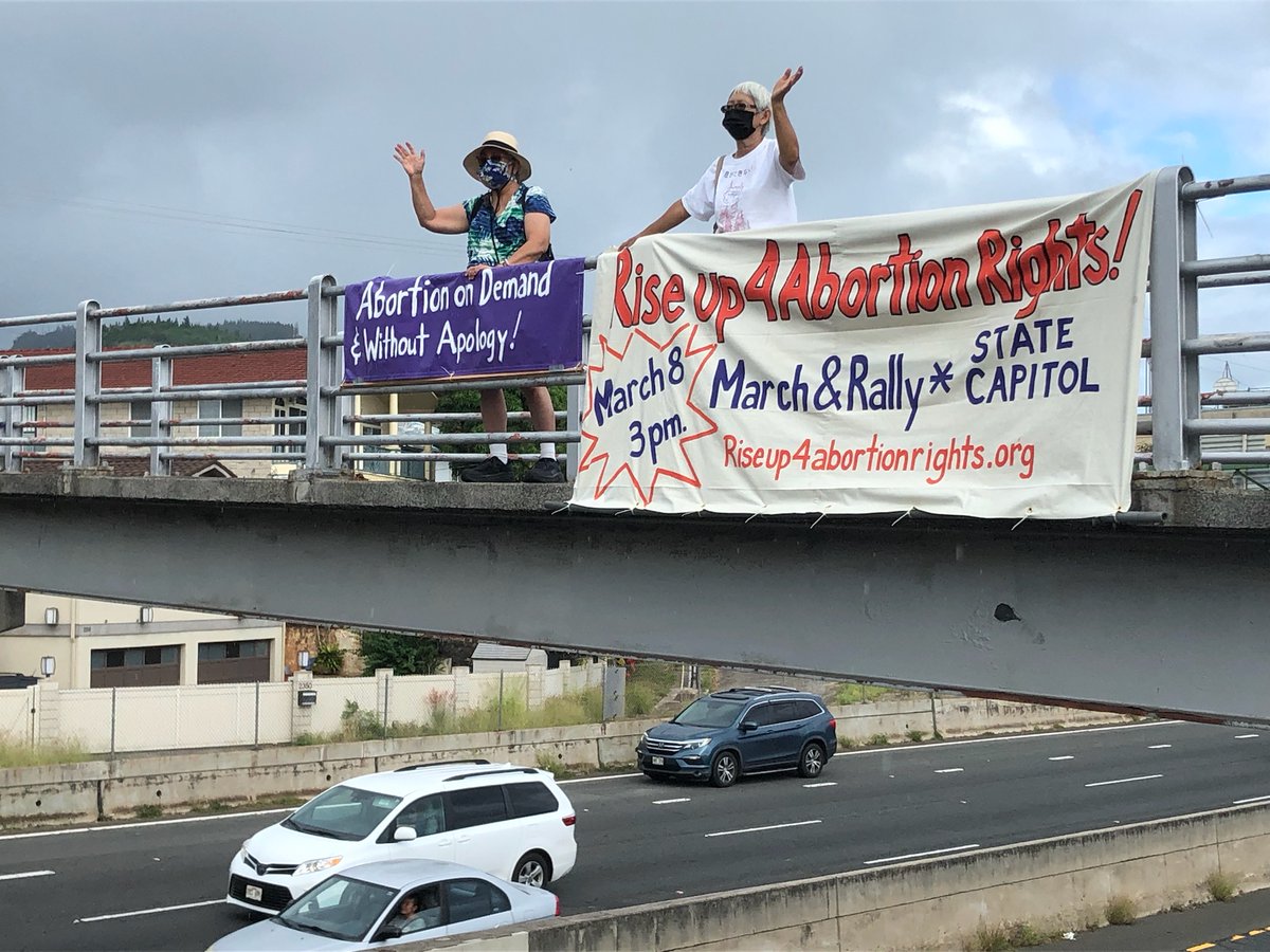 Refusefascismhi's tweet photo. Creating a buzz about the March on International Women's Day! It only takes a few people to reach thousands more from an overpass but it takes sustained actions to get attention. #riseup4abortionrights, #strikefor choice, #ruthsentus, #refusefascism https://t.co/jeGBh6hfXx