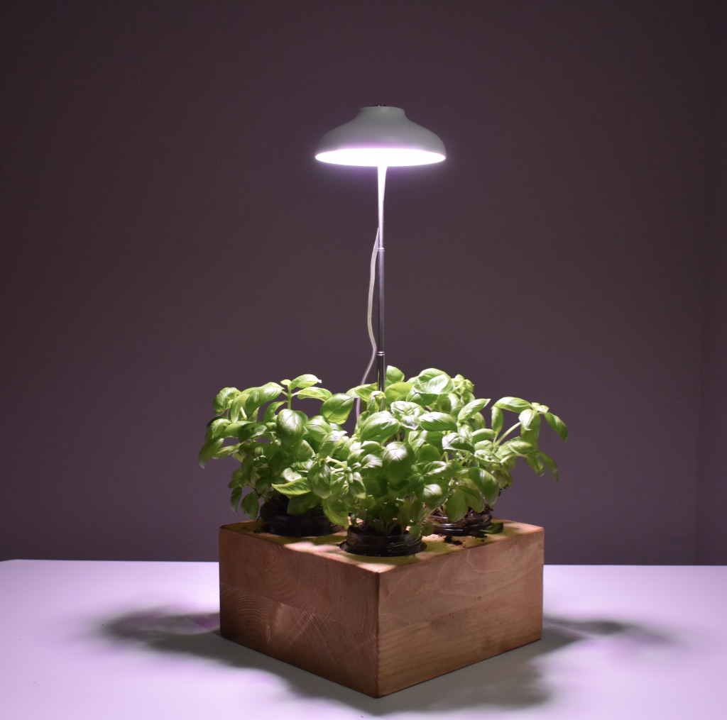 We produce Mini-Gardens which allow people to cultivate their favourite herbs during the entire year within the space of their own home. Our handmade product compromises an up-cycled wooden basis, recycled glasses, earth, seeds, glass and a LED-plant lamp! #startup by #students